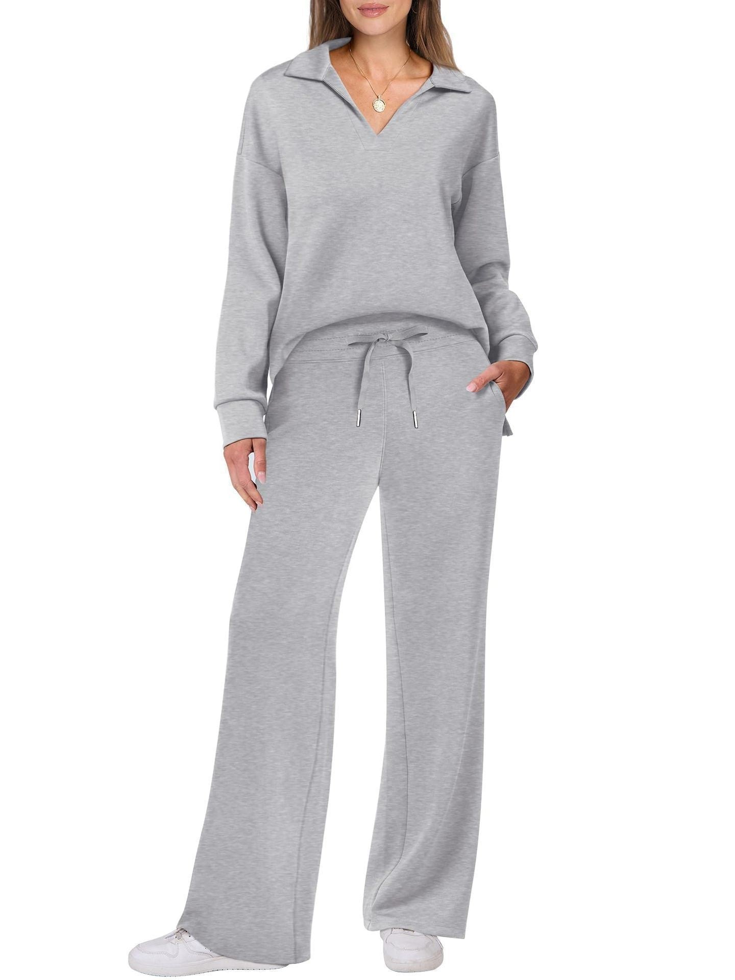 Damen Freizeitanzug mit Zipper-Pullover und weiter Hose