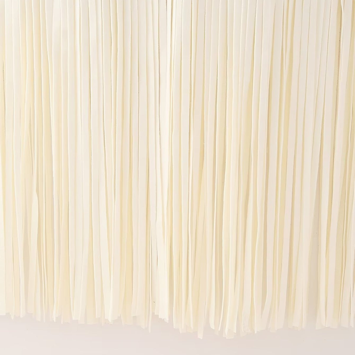 Petra | Eleganter Mantel in Cremeweiß mit Fransen-Detail