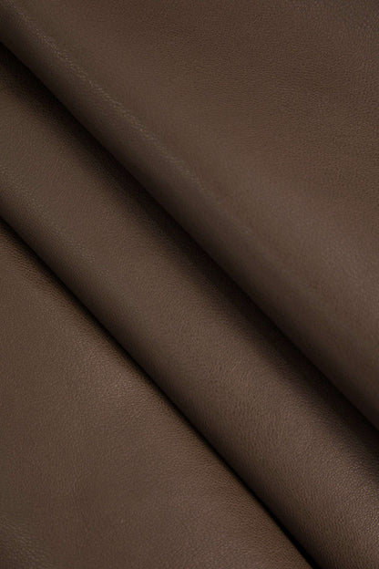 Marigold | Verspielter Kunstleder-Skaterrock mit High-Waist-Schnitt und ausgestelltem Saum