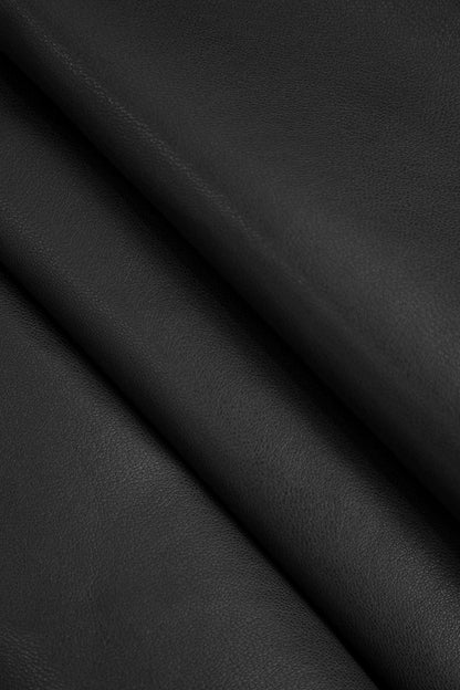 Marigold | Verspielter Kunstleder-Skaterrock mit High-Waist-Schnitt und ausgestelltem Saum