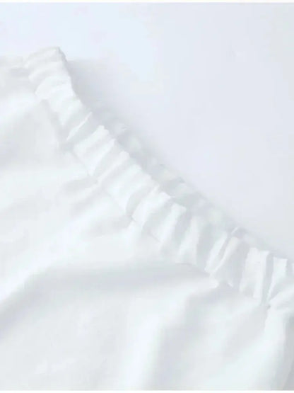 Zoë | Leichtes Leinenset mit gerüschtem Saum und Ballonärmeln